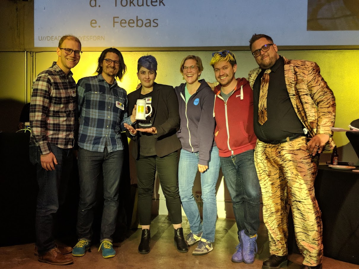 Sooo close! Our 2nd place team, Team Planet, on-stage with our emcee, CooperQ.