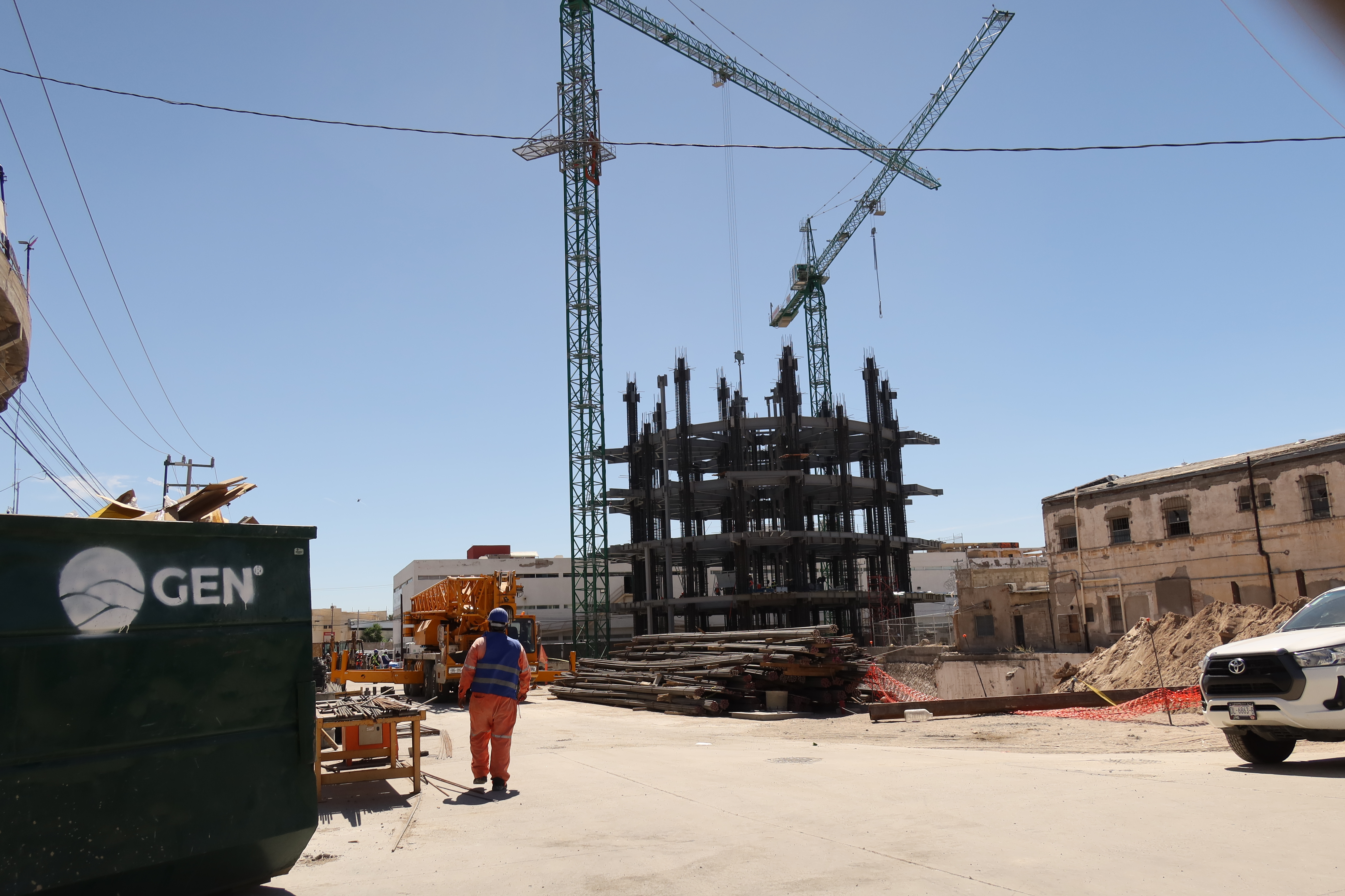 EFF A construction site with a crane and the first few floors of a skyscraper.